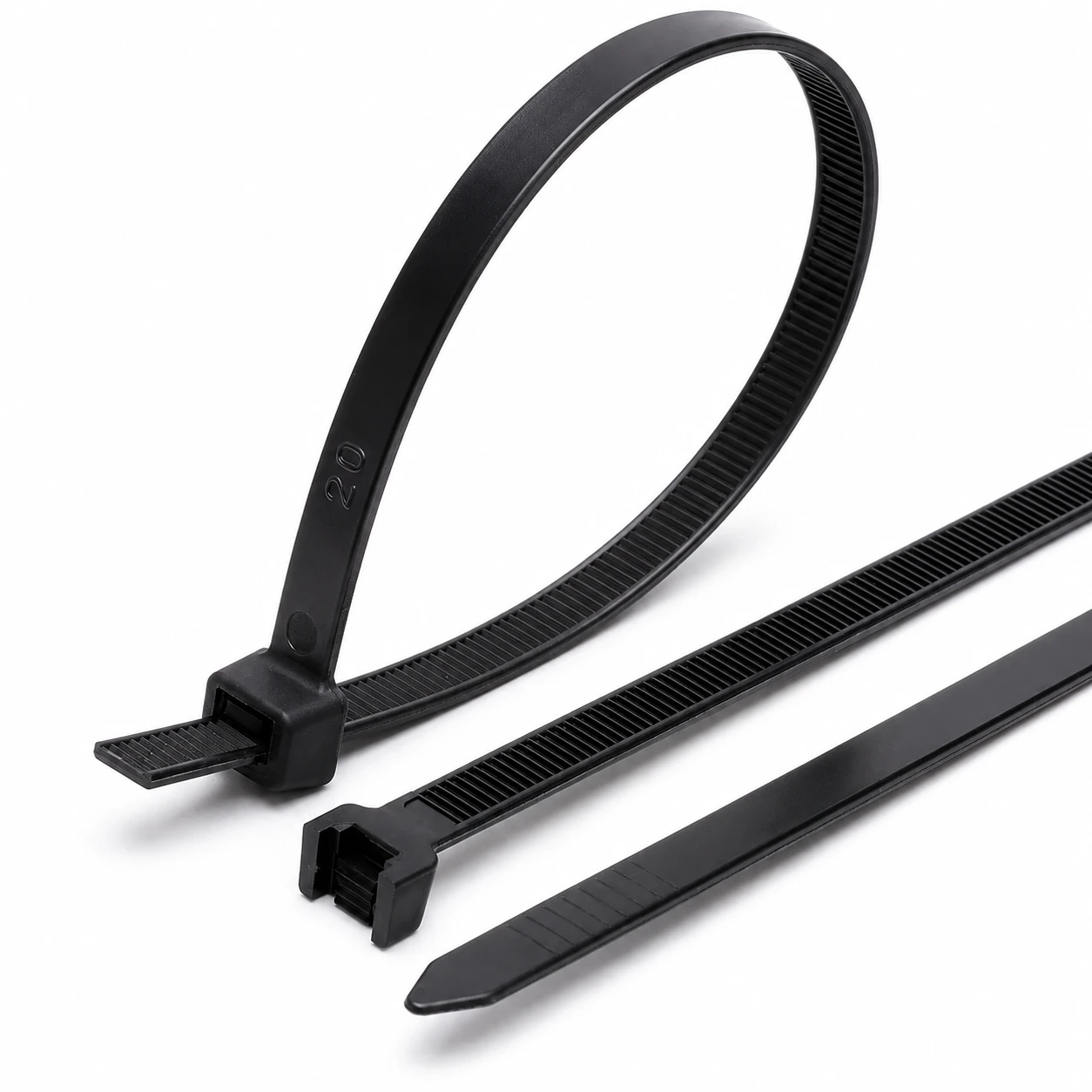 Close up of 7.6mm heavy duty cable ties with reinforced locking head and serrated strap