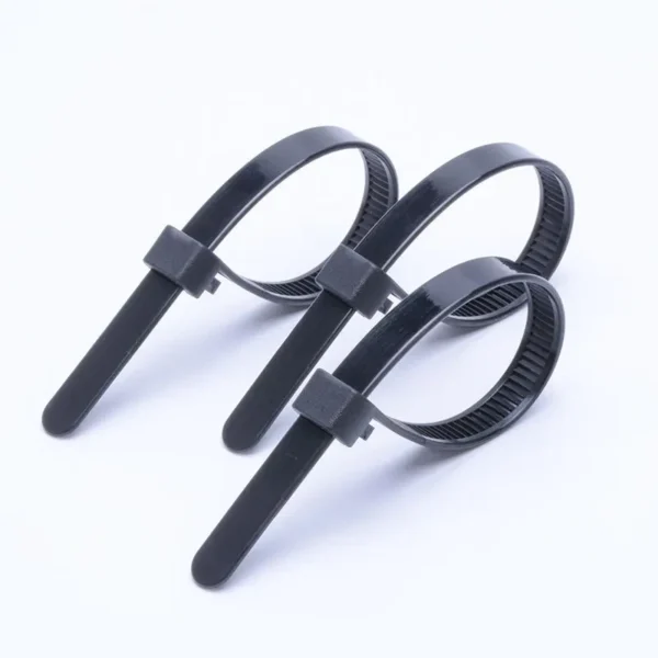 Three black releasable cable ties for reusable cable management applications