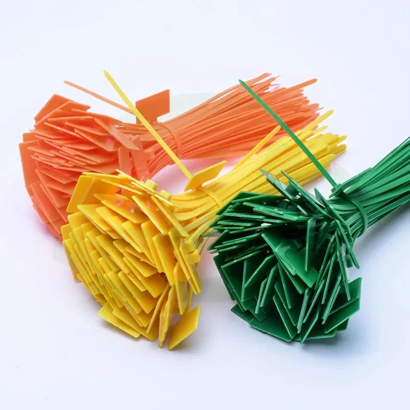 Colored marker cable ties in orange yellow and green