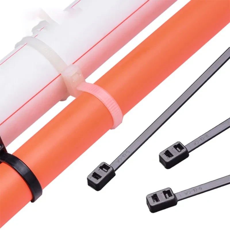 Double head cable ties fastening two separate pipes