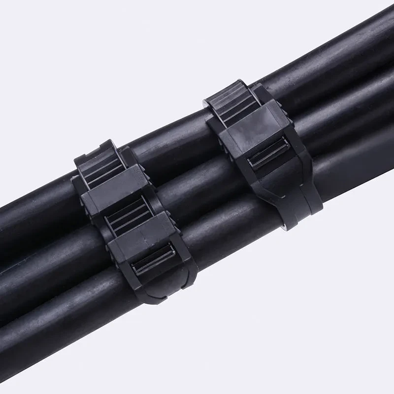 Double locking cable ties securing black cable bundles