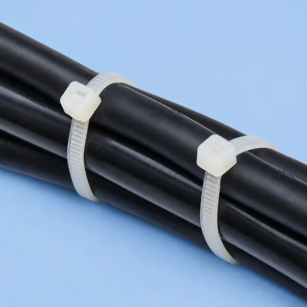 Heat stabilized cable ties fastening black wires