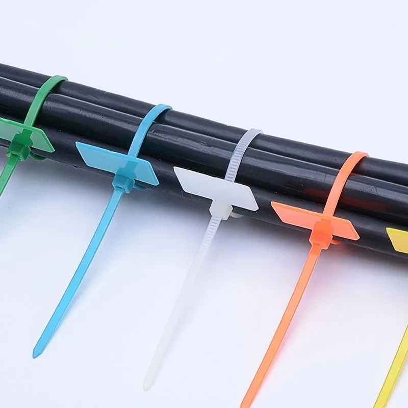 Marker cable ties identifying black cable bundles