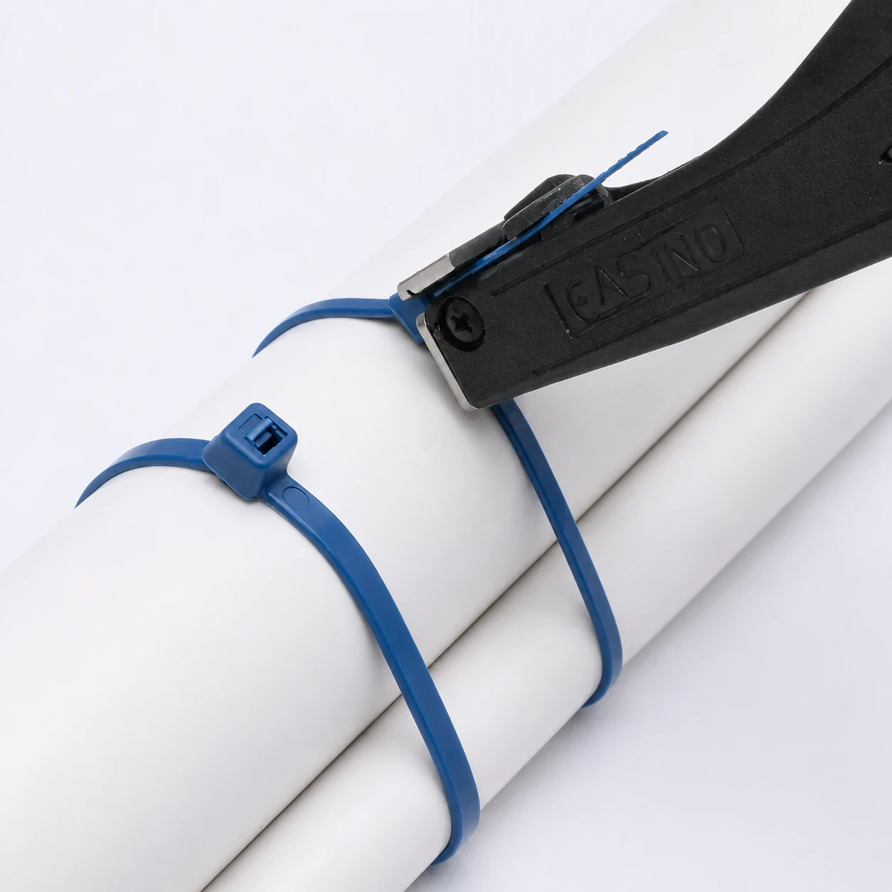 Metal detectable cable ties used with cable tie tool