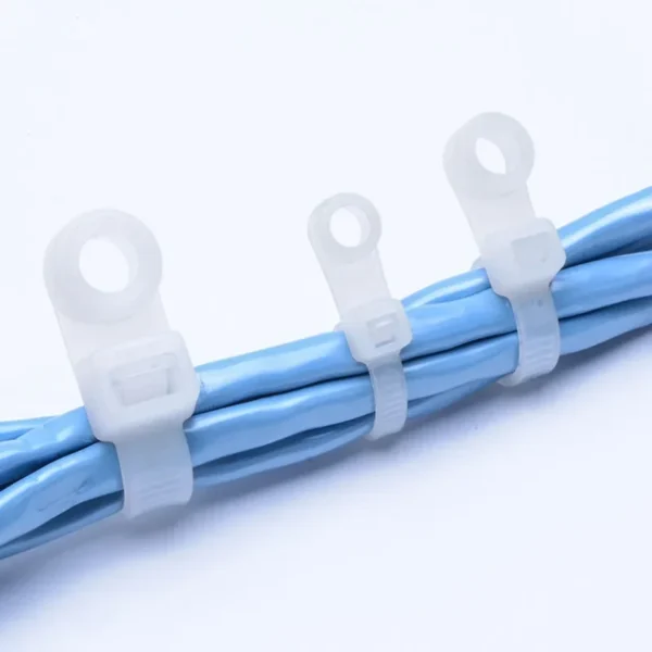 Mountable head cable ties securing blue wire bundles