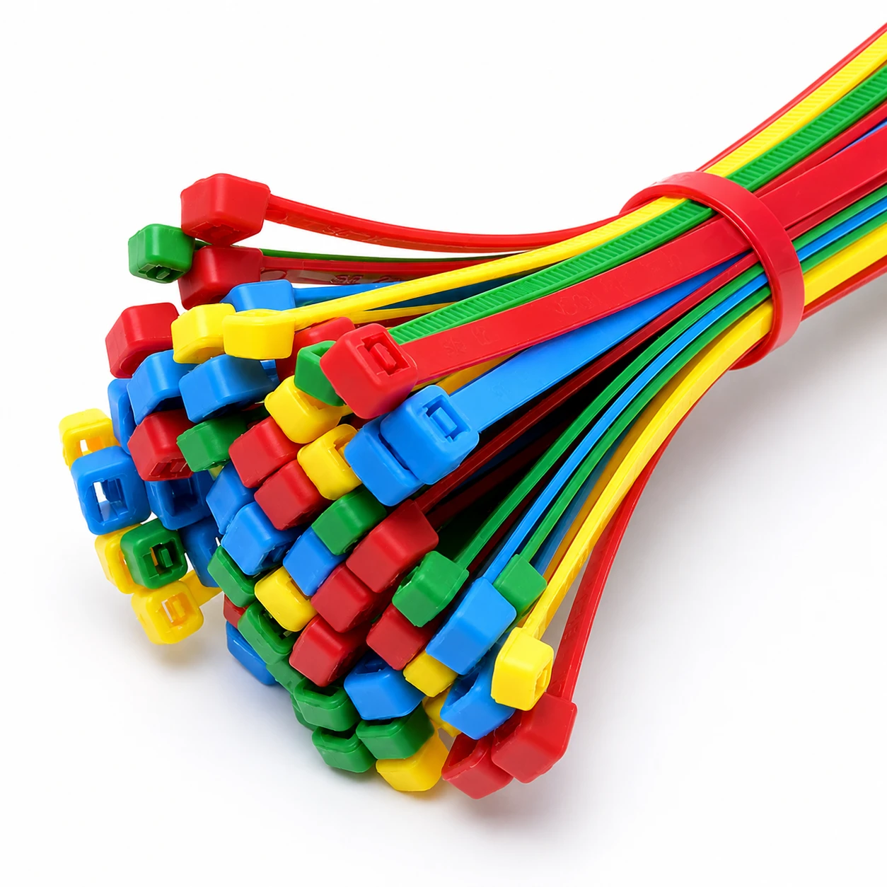 Multi coloured cable ties bundled together in red, yellow, blue, and green for cable organization