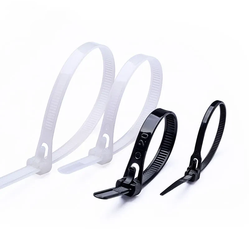Six black releasable cable ties with adjustable locking heads for cable management