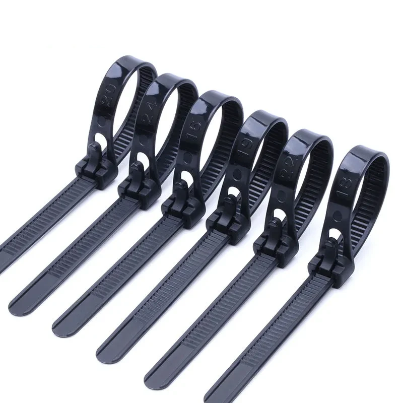 White and black releasable cable ties in different sizes for cable management